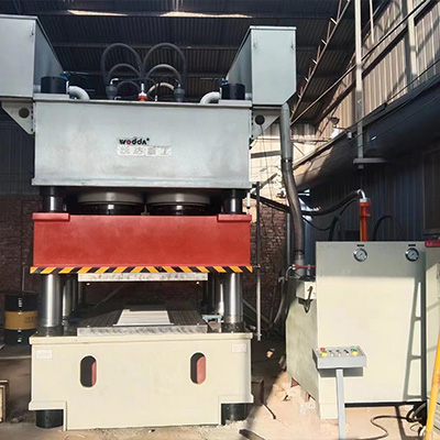 3000噸(dūn)鋼木門壓花機